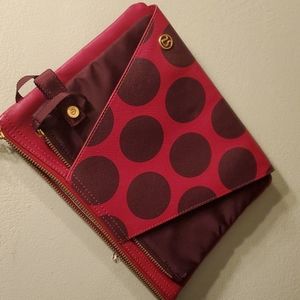 Lululemon wristlet with interlocking cosmetic bag.